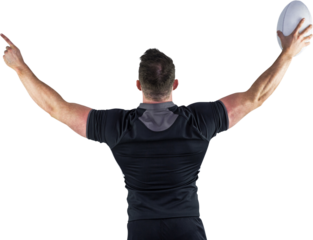 Rugby player celebrating with the ball
