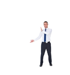 Full length of smiling businessman standing