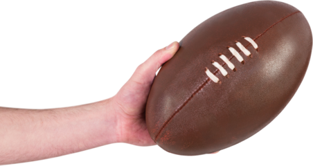 Rugby player handing a rugby ball