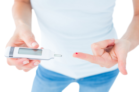 Woman testing her blood glucose level 