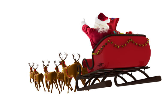 Santa Claus riding on sleigh during Christmas