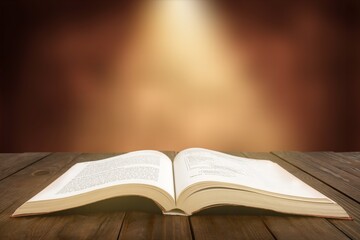 Open Bible book on wooden table