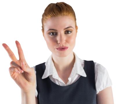 Redhead businesswoman showing peace sign - Powered by Adobe