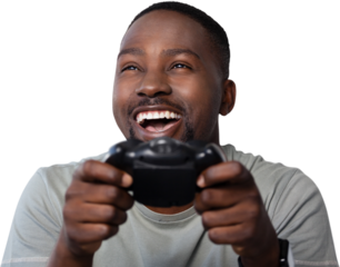 Smiling man playing video game against white background