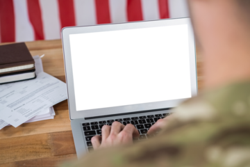 Soldier using laptop