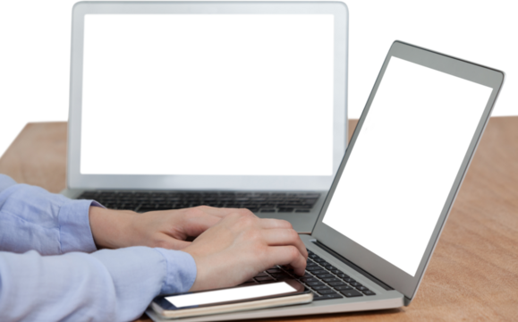 Businesswoman typing on laptop