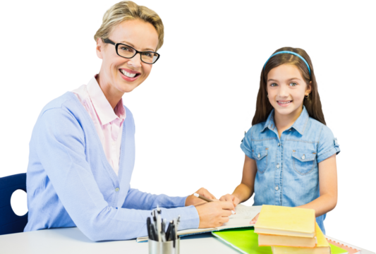 Portrait of teacher with student writing on book
