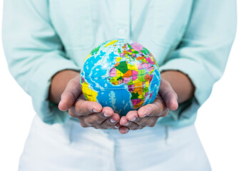 Mid section of businesswoman holding globe