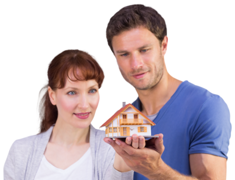 Couple holding a model house