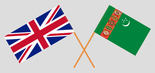 Crossed flags of United Kingdom and Turkmenistan. Official colors. Correct proportion