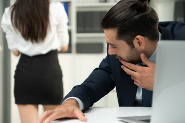 Executives staring at the buttocks of employees in the company with emotional feelings and preferences. The concept of harassment and sex in the office.
