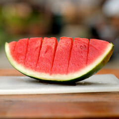 Watermelon tropical fruit has red flesh refreshing sweet taste.