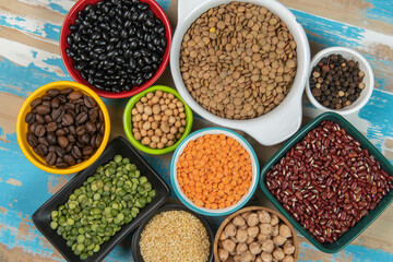 assorted bowls with raw grain and seeds top view