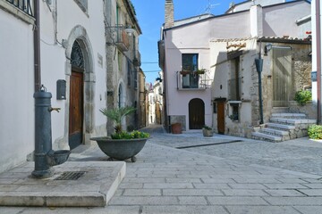 A narrow street among the old houses of Larino, a medieval town in the province of Campobasso in Italy.