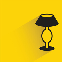 bedside lamp with shadow on yellow background