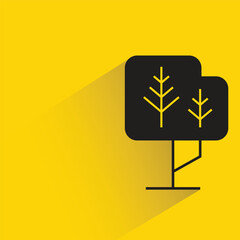 tree with shadow on yellow background