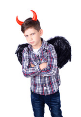 Little boy with a devil costume - 592325518
