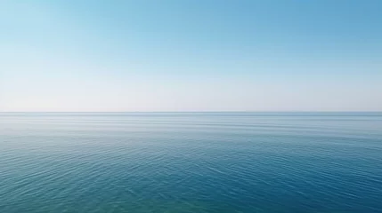 Fotobehang Tranquil minimalist landscape with a smooth blue sea surface with calm waters with a horizon and clear skies. Simple beautiful natural calm background. Generative AI. © Pro Hi-Res