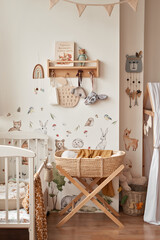 Children's educational wooden toys. Nursery decor. Scandinavian style playroom. Wicker cradle