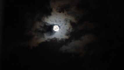 Naklejka na ściany i meble moonlight in the clouds