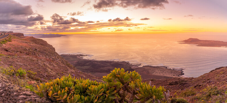View of coastline, sunset and Atlantic Ocean from Mirador del Rio, Lanzarote, Las Palmas