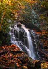 waterfall in autumn forest