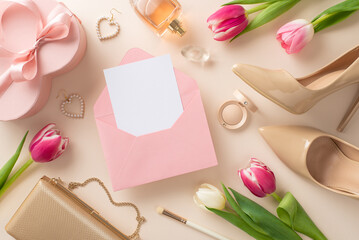 Chic Mother's Day celebration concept. Flat lay of high-heels, handbag, gift box, tulip flowers, lipstick brushes, earrings on a pastel beige background with open envelope with empty space for text