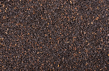 Basil seeds background. Ocimum basilicum. Top view.