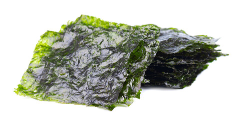 Crispy nori seaweed isolated on white background. Japanese food nori. Dry seaweed sheets.