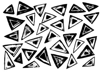 
Black and white triangles of different sizes on a white background. Ink. Printing.
