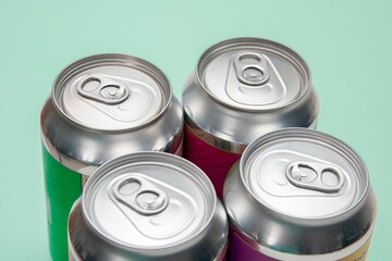 Closeup view of four metal beverage cans