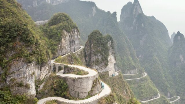flyover The winding road of Tianmen mountain national park (Zhangjiajie) in clouds mist, Hunan province, China