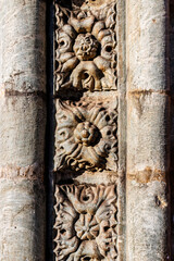 Facade of Catholic church of St. Francis of Assisi in Goa Velha - Stone flower decoration, Goa, India, Asia