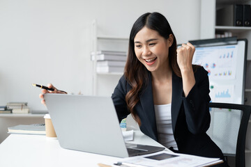 Happy businesswoman celebrating after hearing a good news, mission accomplished concept.