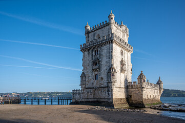 Fototapeta na wymiar Belem tower and wooden pier during day in Lisbon, Portugal