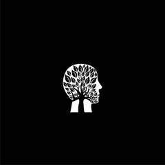 Tree in the shape of head icon isolated on dark background - obrazy, fototapety, plakaty