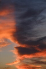 Fototapeta na wymiar Beautiful view of clouds in the sky during an orange sunset