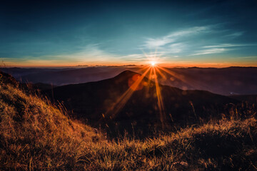 Beautiful landscape in the mountains at sunset. Colorful sunset in the mountain landscape and...