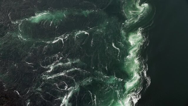 Top view of strong tidal current Salstraumen in Norway with vortex
