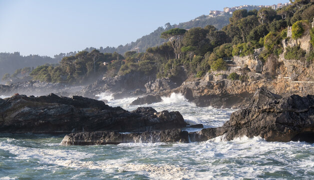Waves crashing on rocky coastline, Lerici, La Spezia, Liguria, Italy