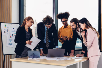 Diverse colleagues gather in brainstorm discuss statistics together. Group of people colleagues gather doing Brainstorming business plan together. Team Brainstorm Working Concept. people meeting 