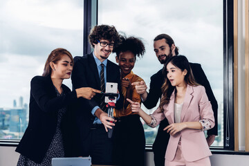 Group of people making online call using Tablet or smart phone . business people work at modern office and virtual video conference meeting with colleagues business people