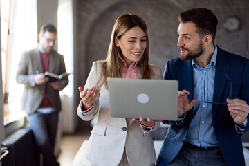 Business people working on laptop