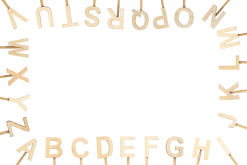 Wooden letters forming the alphabet around the screen with free space in the middle. Green chroma background.