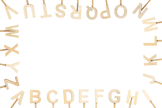 Wooden letters forming the alphabet around the screen with free space in the middle. Green chroma background.