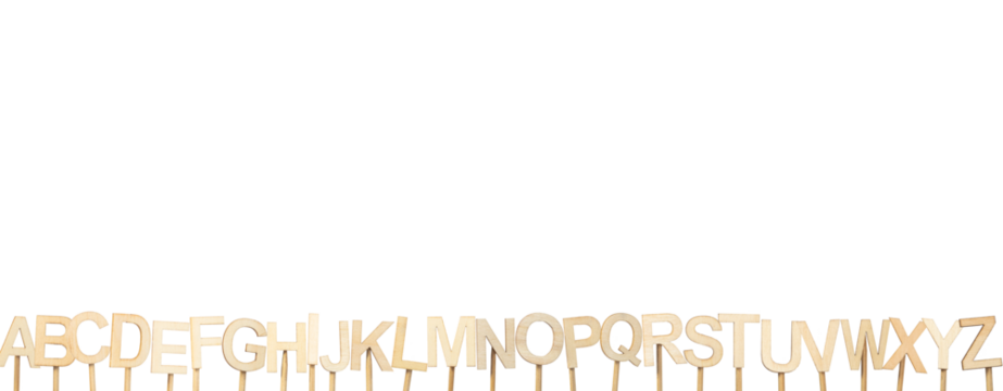 Alphabet banner made with individual wooden letters on a green chroma background.