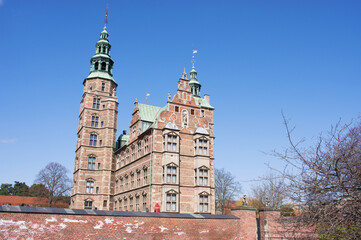 Rosenborg castle in Copenhagen in Denmark with a clear blue sky