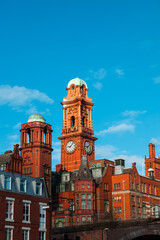 A red brick Victorian side angle building named Palace Hotel in Manchester UK