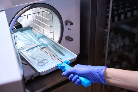 Close up the process of sterilizing medical instruments in an autoclave
