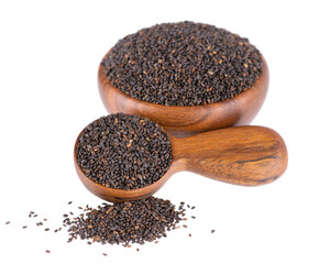 Basil seeds in wooden bowl and spoon, isolated on white background. Ocimum basilicum.